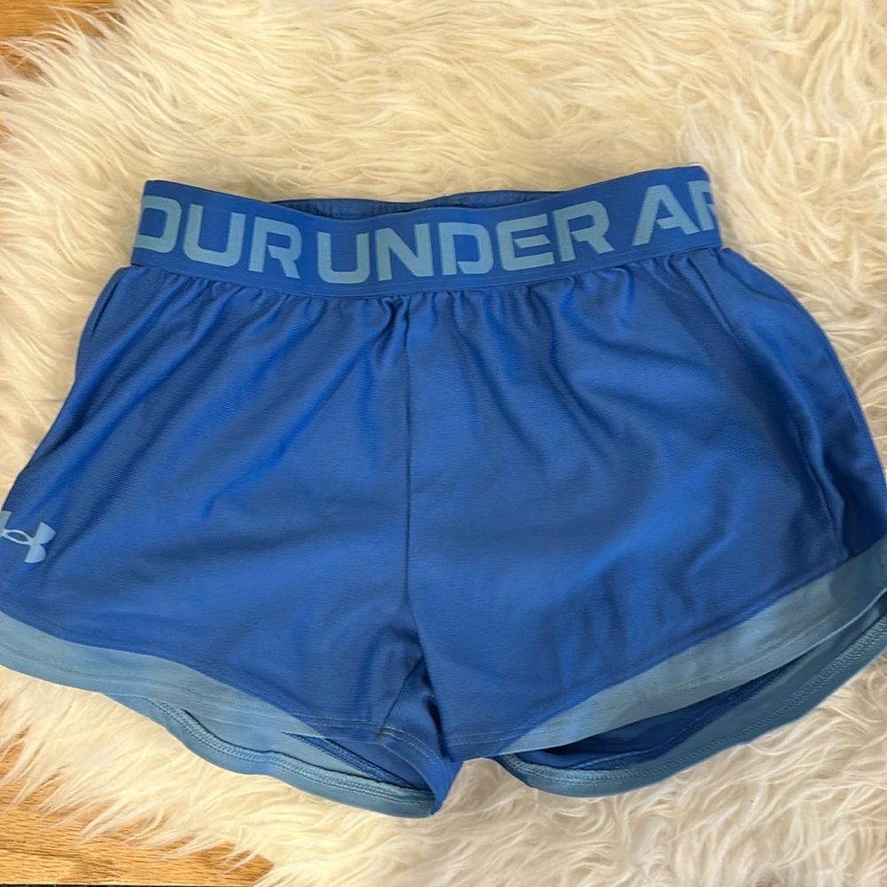 Two pair of youth M Under Armour girls shorts